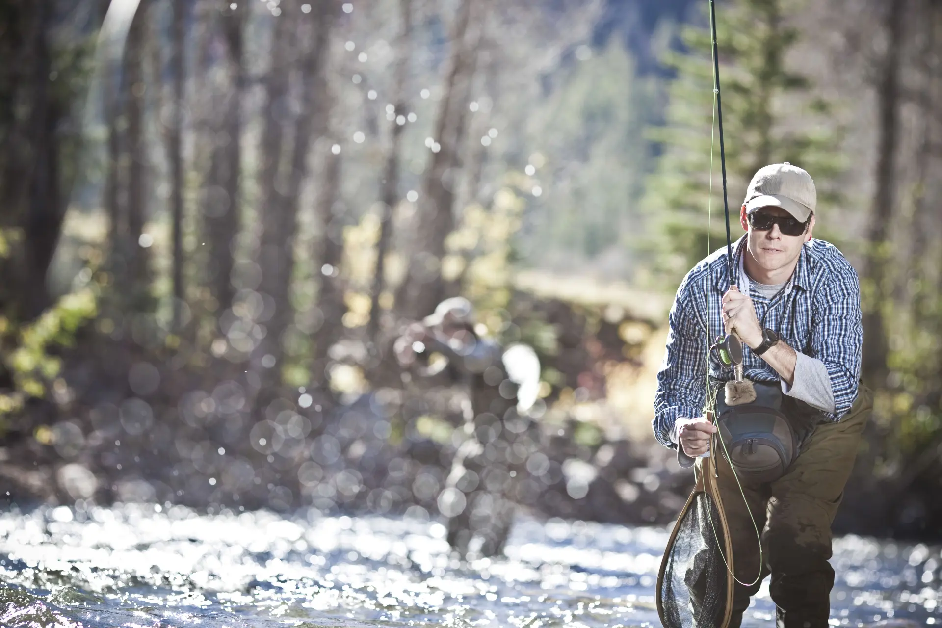 A guest enjoying a memorable fishing trip in Scotland